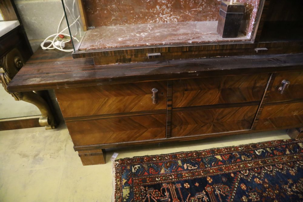 A Continental figured walnut marble inset side cabinet, W.200cm, D.50cm, H.173cm